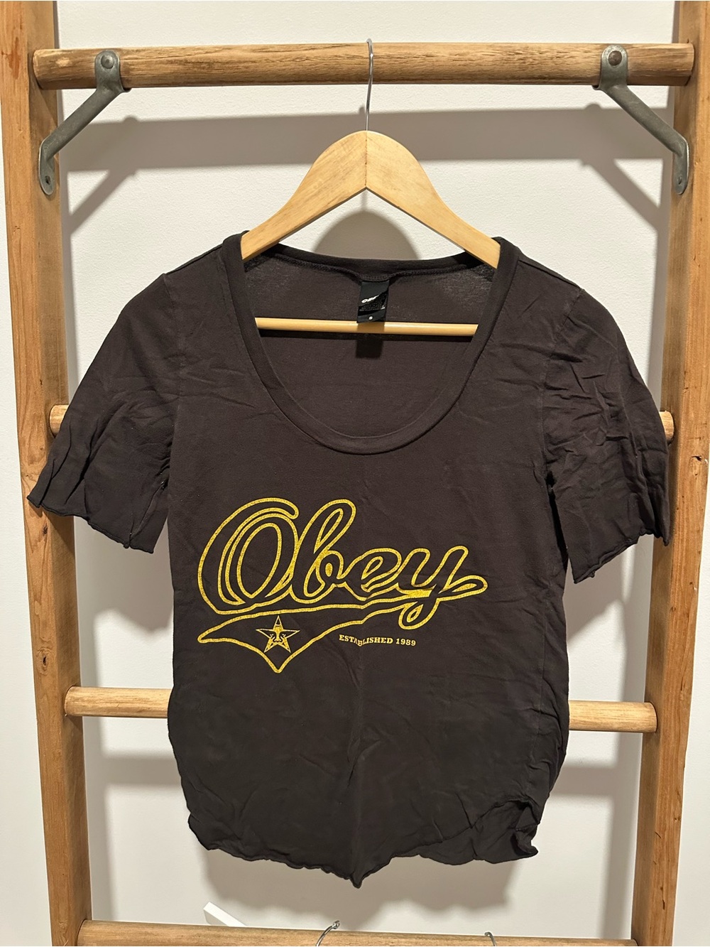 Obey Women's Black Scoop Neck Tee with Yellow Script Logo